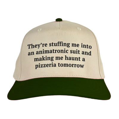 They're stuffing me into an animatronic Vintage Hat!